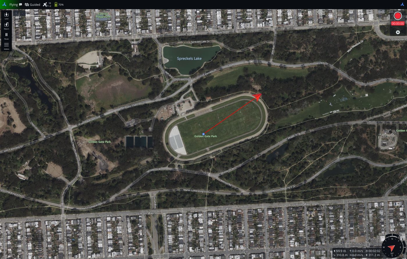 RotorLab GC Fly view: the aircraft airborne under guided control over a park, with the flown track, mode and battery on the status bar and altitude, speed and time in the corner.